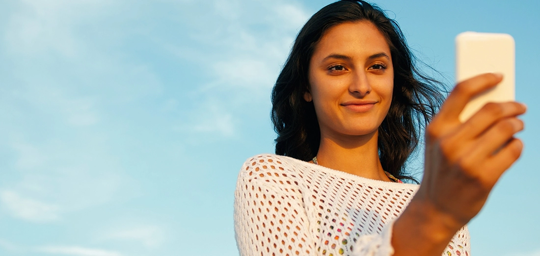 Beautiful girl using smartphone