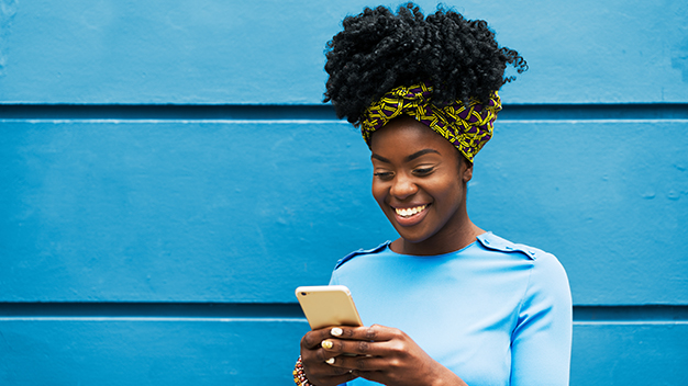 Woman smiling with smart phone